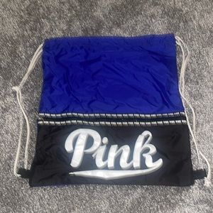 Pink bag blue and white draw string